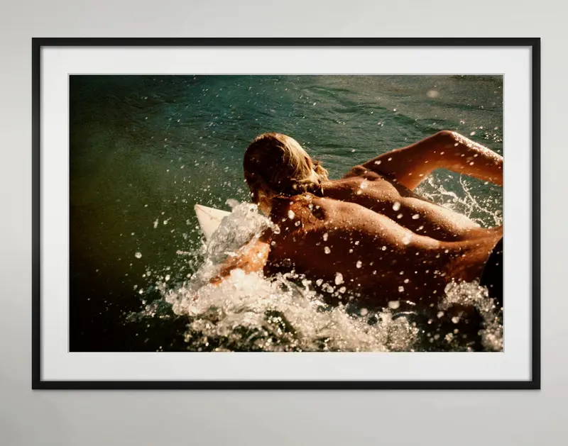 Clay Marzo paddling out