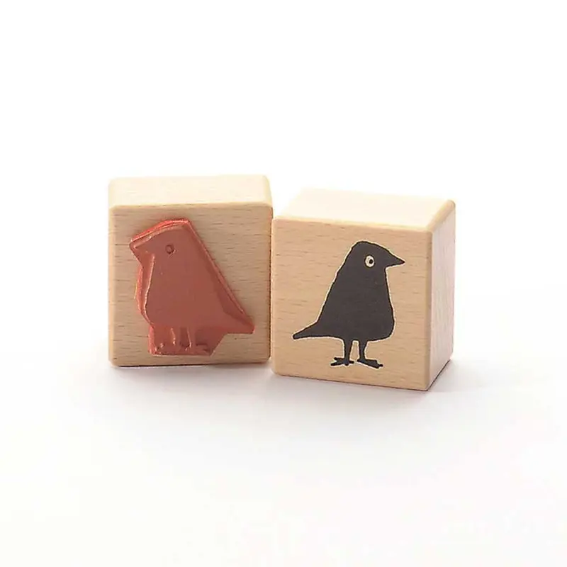 Liten stämpel med svart fågel (4 x 4 cm)