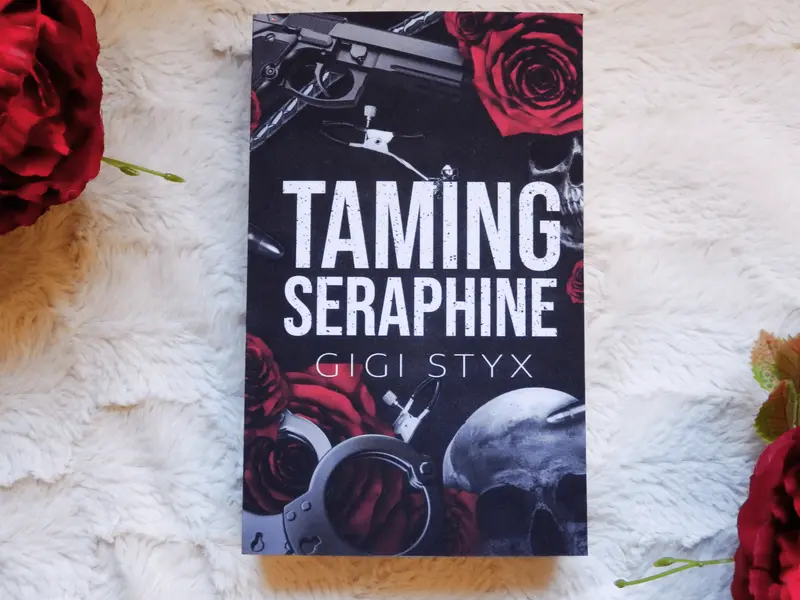Taming Seraphine (Morally Black, bok 1), av Gigi Styx (pocketutgåva, engelska)